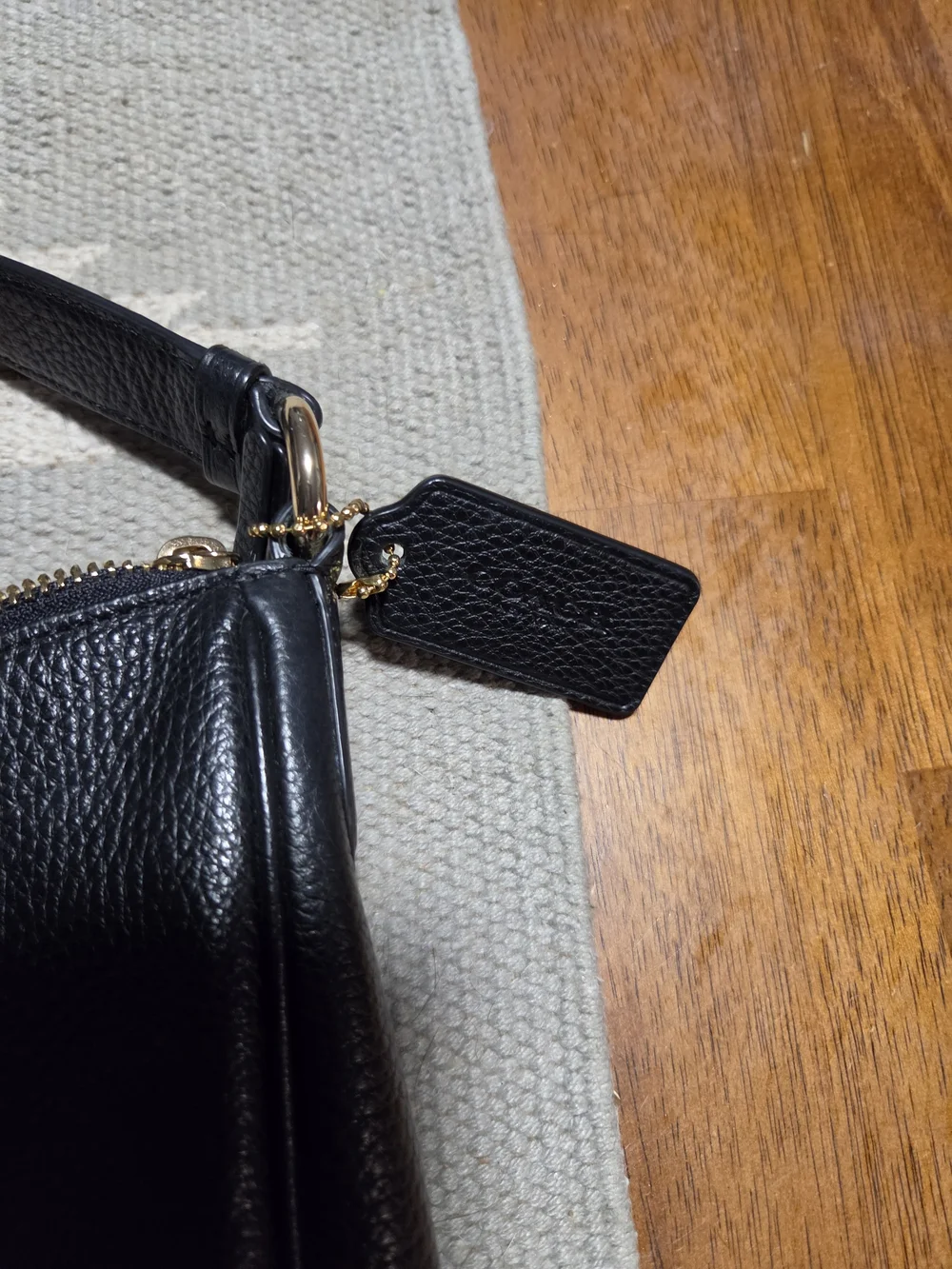Coach black pebbled